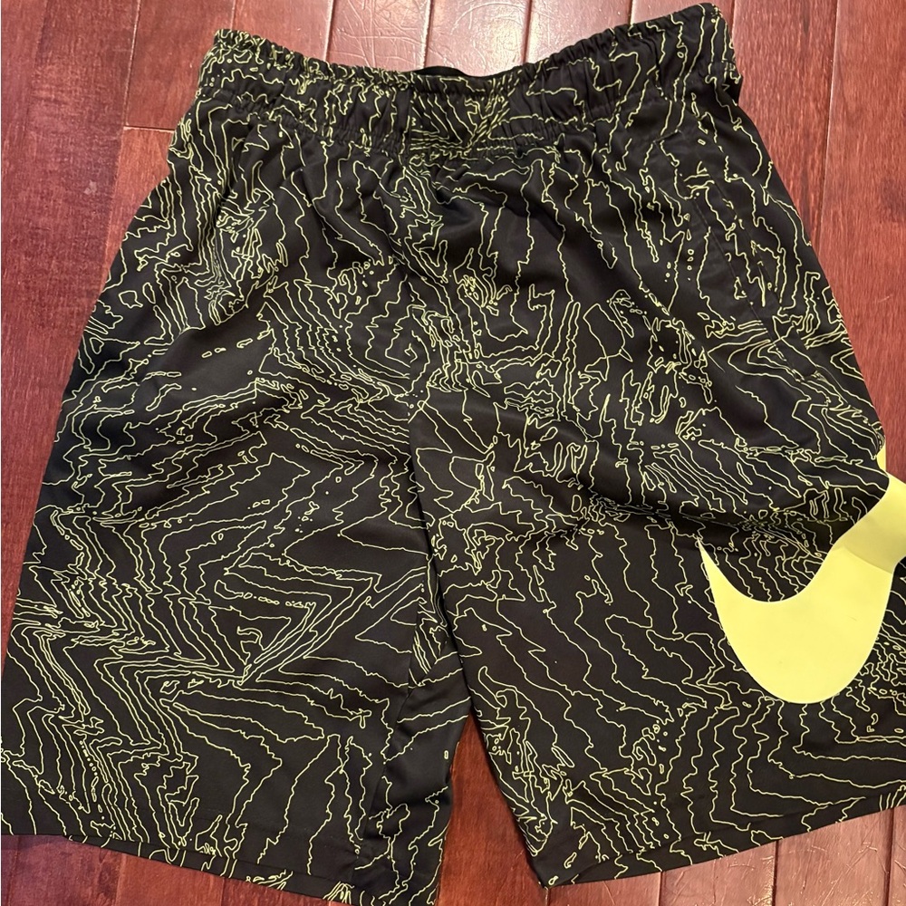 Nike Black Athletic Shorts with Neon Yellow Graphic and Large Swoosh